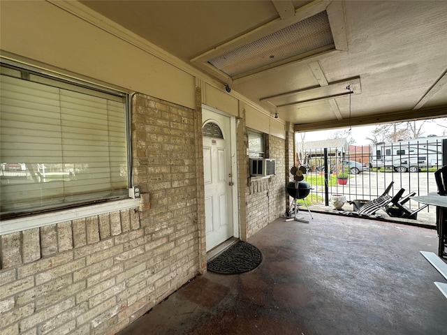 view of patio / terrace with cooling unit and visible vents