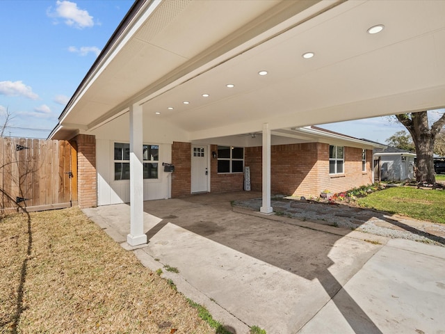 view of patio featuring fence