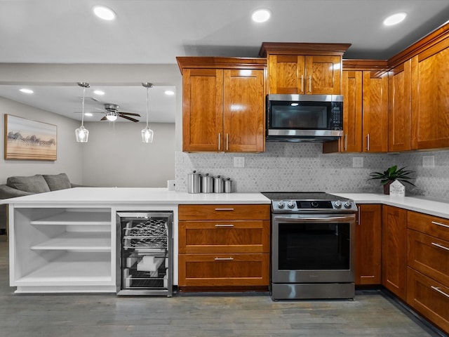 kitchen featuring open shelves, stainless steel appliances, light countertops, wine cooler, and backsplash