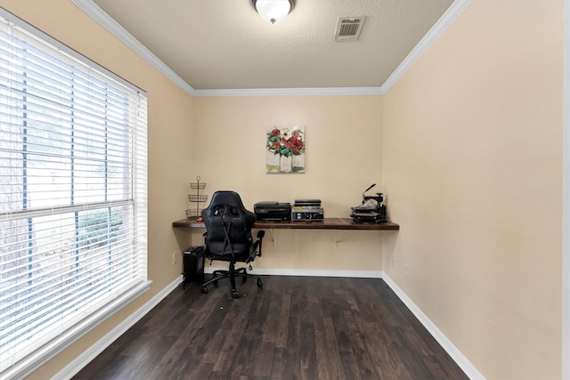 office featuring a textured ceiling, visible vents, baseboards, dark wood finished floors, and crown molding