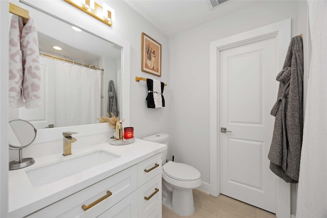 bathroom with visible vents, toilet, wood finished floors, curtained shower, and vanity