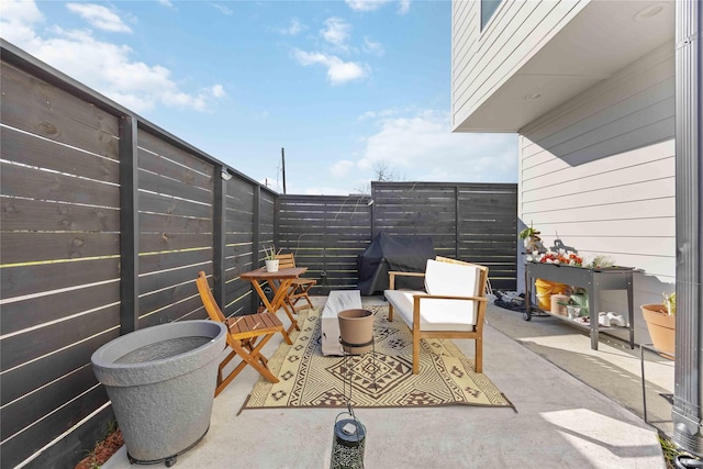 view of patio with a fenced backyard