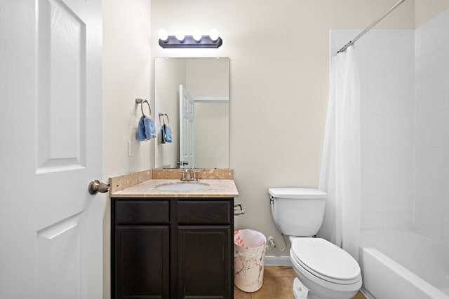 bathroom with baseboards, toilet, shower / tub combo with curtain, tile patterned flooring, and vanity