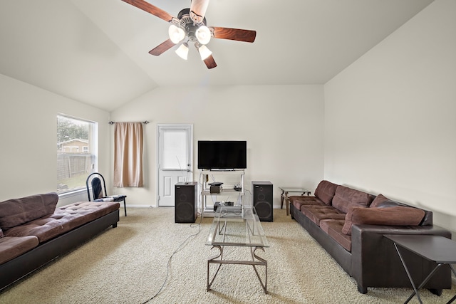 living area with lofted ceiling, baseboards, a ceiling fan, and carpet flooring