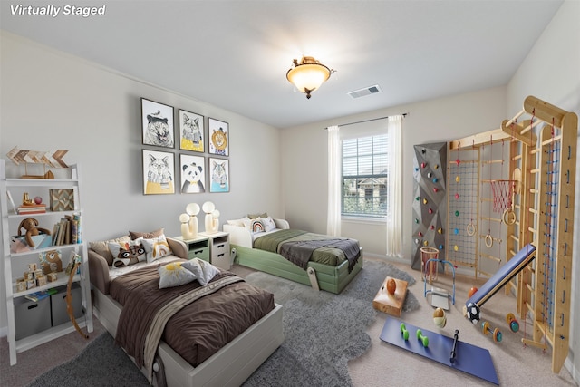 bedroom featuring carpet and visible vents