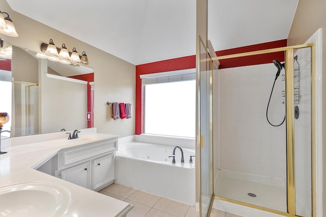 bathroom featuring a stall shower, vanity, and tile patterned floors