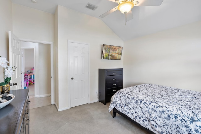 bedroom featuring lofted ceiling, visible vents, light carpet, ceiling fan, and baseboards