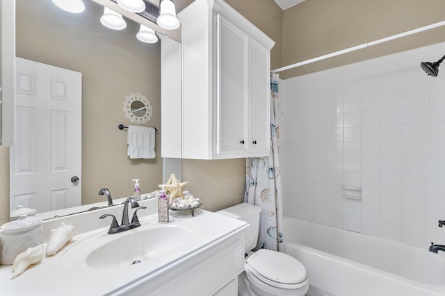 full bath featuring shower / tub combo with curtain, vanity, and toilet