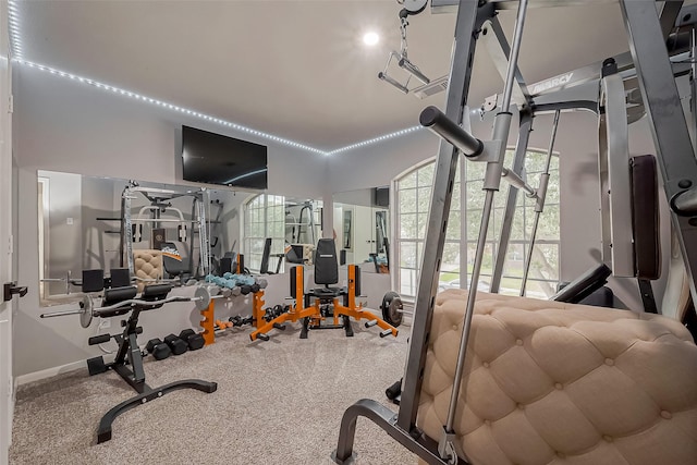 gym with baseboards and visible vents