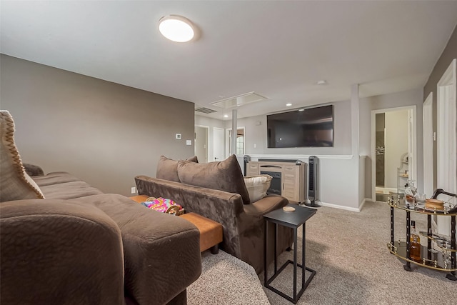 carpeted living area with attic access, visible vents, and baseboards