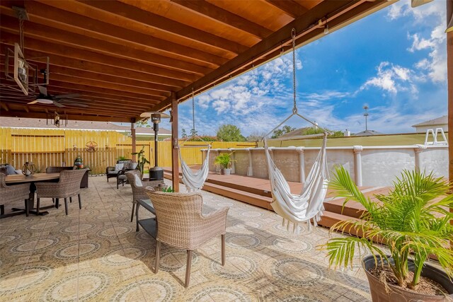 view of patio with fence