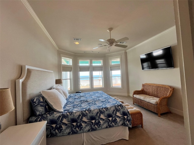 bedroom featuring carpet floors, visible vents, ornamental molding, and baseboards