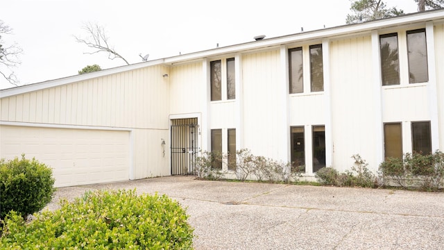 view of front of property with concrete driveway