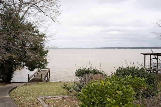 view of dock with a water view