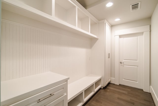 mudroom with visible vents, dark wood-style flooring, and recessed lighting