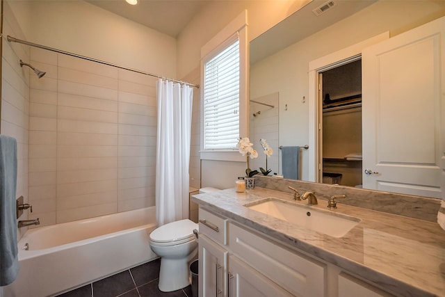 full bath with toilet, vanity, visible vents, tile patterned floors, and shower / bathtub combination with curtain