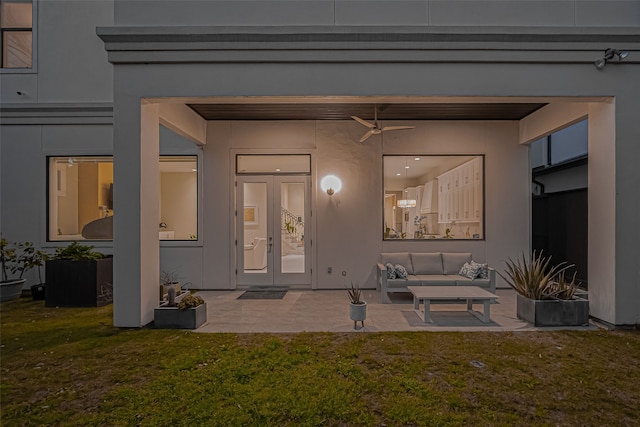 2217 W Main St, Houston, TX 77098 - view of exterior entry with an outdoor living space, a patio area, a yard, and ceiling fan