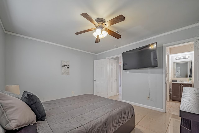 bedroom featuring light tile patterned flooring, a ceiling fan, baseboards, ensuite bath, and crown molding