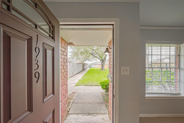 doorway to outside featuring plenty of natural light