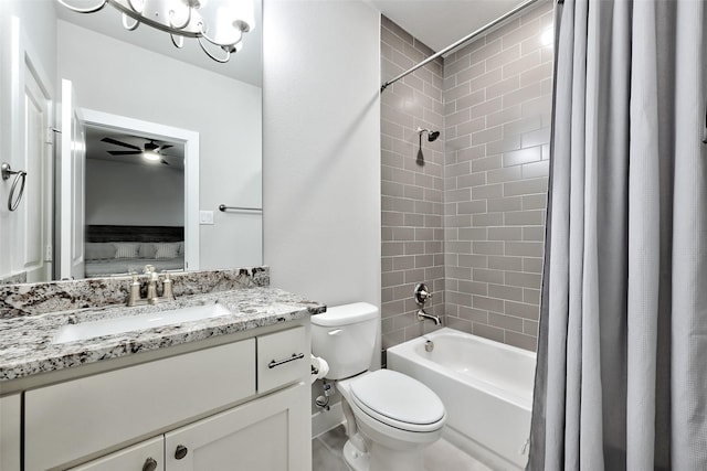 bathroom featuring a ceiling fan, shower / tub combo, vanity, and toilet