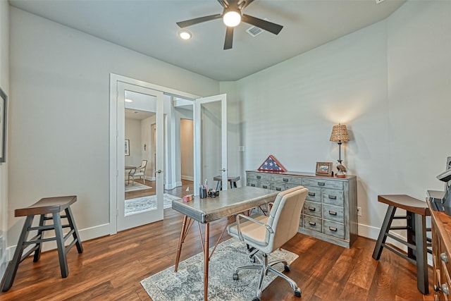 office featuring ceiling fan, dark wood-style flooring, visible vents, baseboards, and french doors