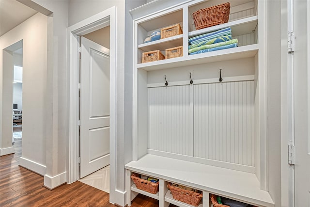 mudroom featuring dark wood-style floors