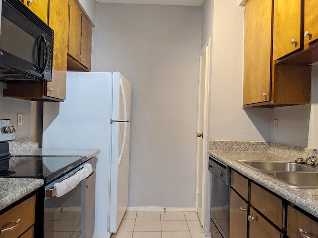 kitchen with brown cabinetry, dishwashing machine, stainless steel electric range oven, black microwave, and a sink