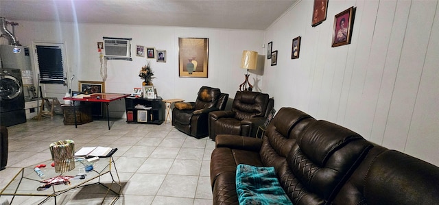 living room with light tile patterned floors, gas water heater, and a wall mounted AC