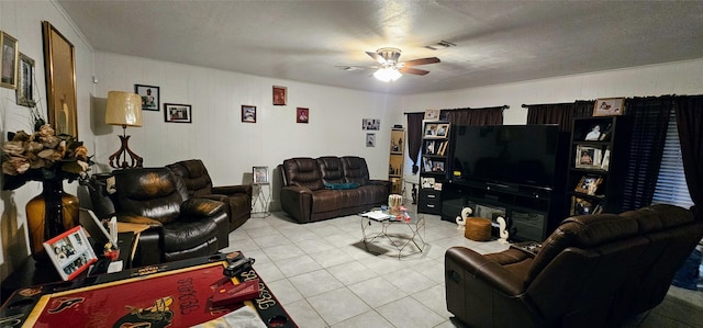 living room with light tile patterned floors, ceiling fan, and visible vents