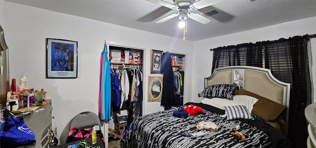 bedroom with visible vents and a ceiling fan