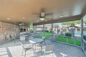 view of patio with ceiling fan and outdoor dining space