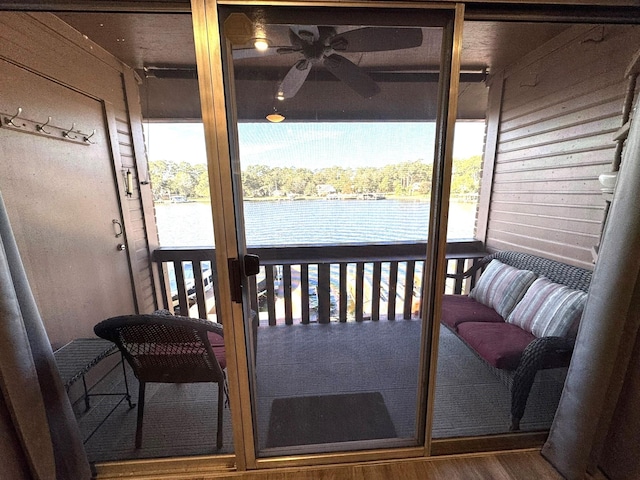 interior space featuring ceiling fan