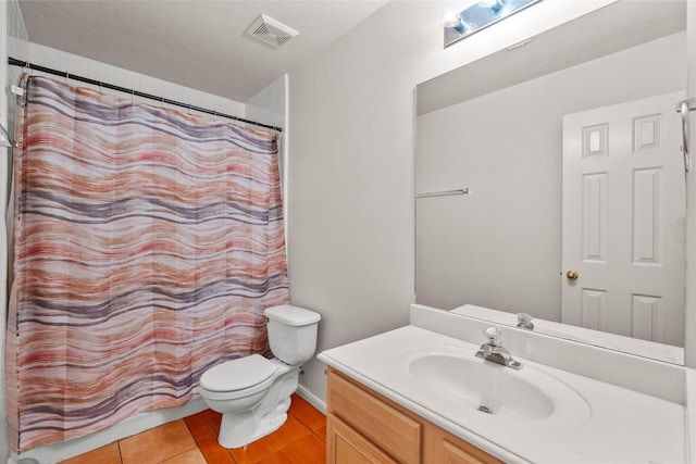 bathroom with tile patterned flooring, toilet, vanity, visible vents, and a shower with curtain