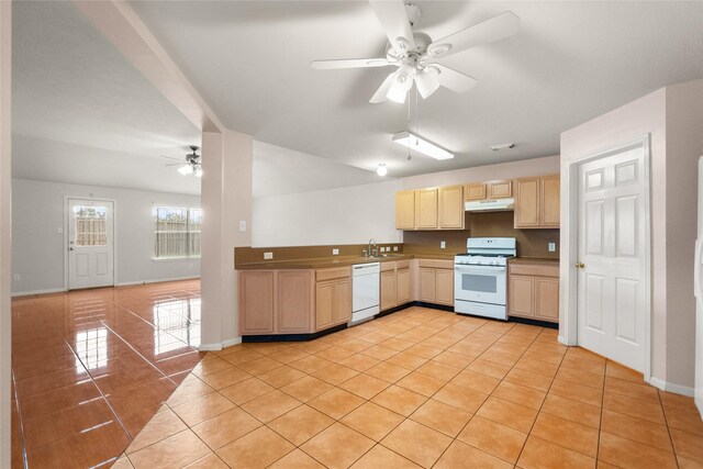 kitchen featuring light tile patterned floors, under cabinet range hood, white appliances, a ceiling fan, and light brown cabinetry