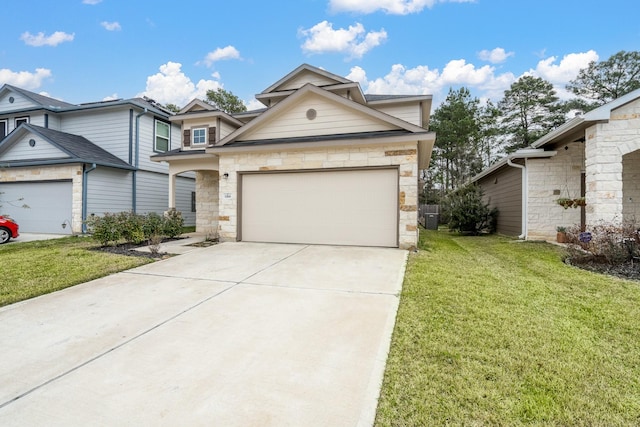 view of front of home with stone siding, an attached garage, driveway, and a front lawn