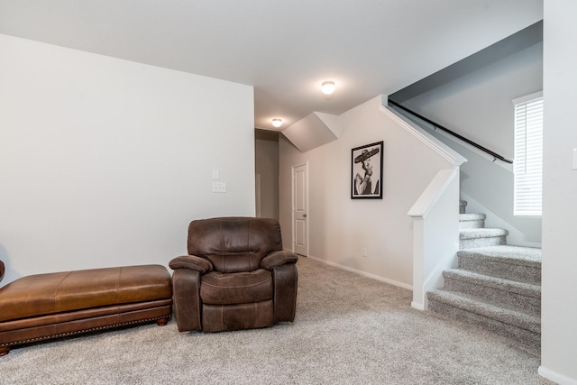 sitting room with stairway, carpet flooring, and baseboards