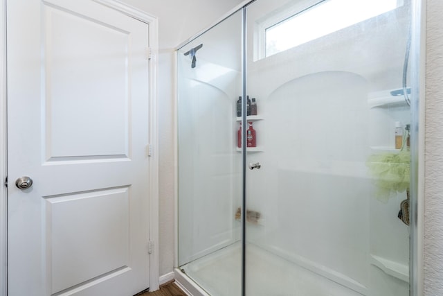 bathroom featuring a stall shower