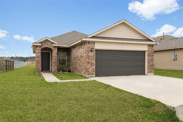 ranch-style house featuring driveway, an attached garage, a front yard, and brick siding