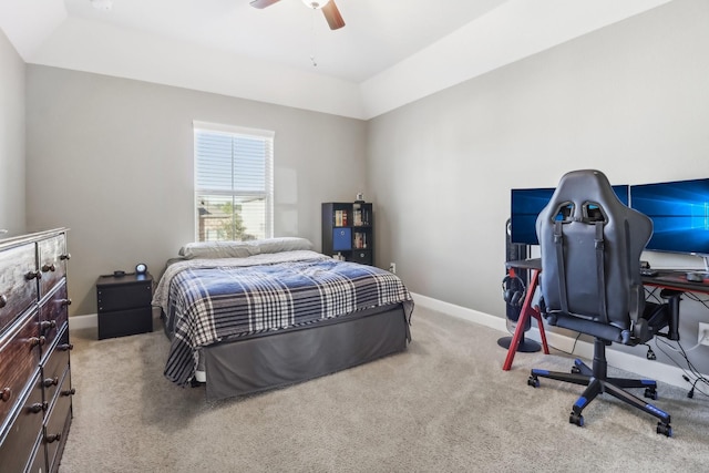 carpeted bedroom with a ceiling fan and baseboards