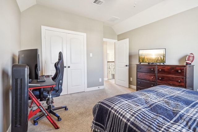 bedroom featuring carpet, visible vents, baseboards, vaulted ceiling, and a closet