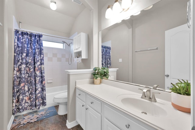 bathroom with lofted ceiling, shower / tub combo, vanity, and toilet