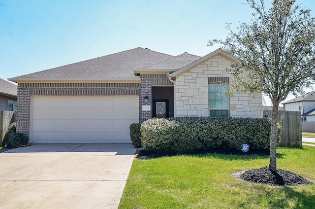 view of front of property with an attached garage, brick siding, driveway, roof with shingles, and a front lawn