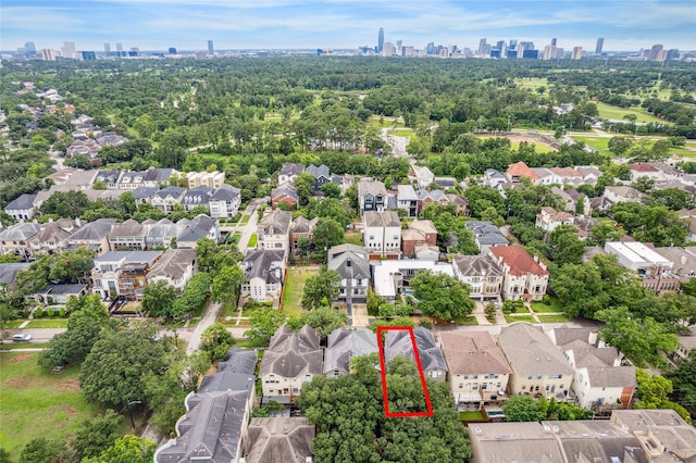 birds eye view of property with a city view and a residential view