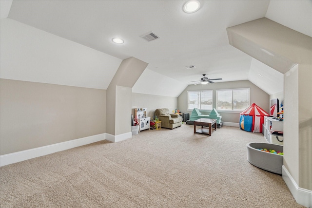 rec room featuring lofted ceiling, baseboards, and visible vents