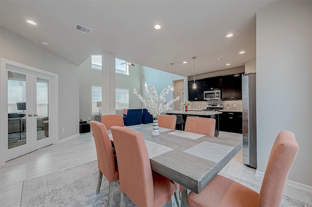 dining area with french doors, marble finish floor, recessed lighting, visible vents, and baseboards