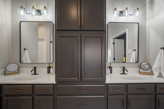 bathroom with double vanity and a sink