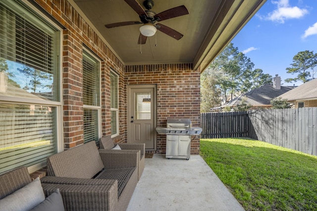 view of patio / terrace featuring a fenced backyard, a grill, and ceiling fan