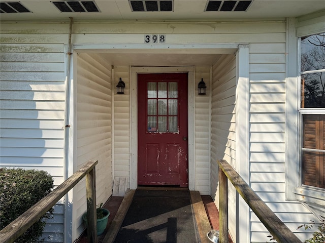 doorway to property with visible vents