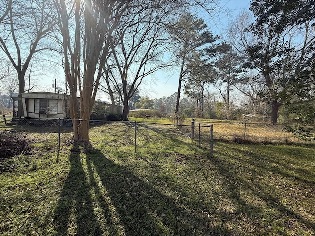 view of yard with fence