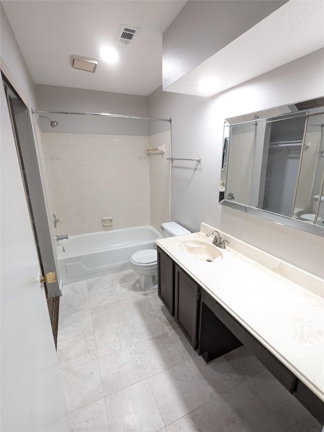 bathroom with shower / bathing tub combination, vanity, and toilet